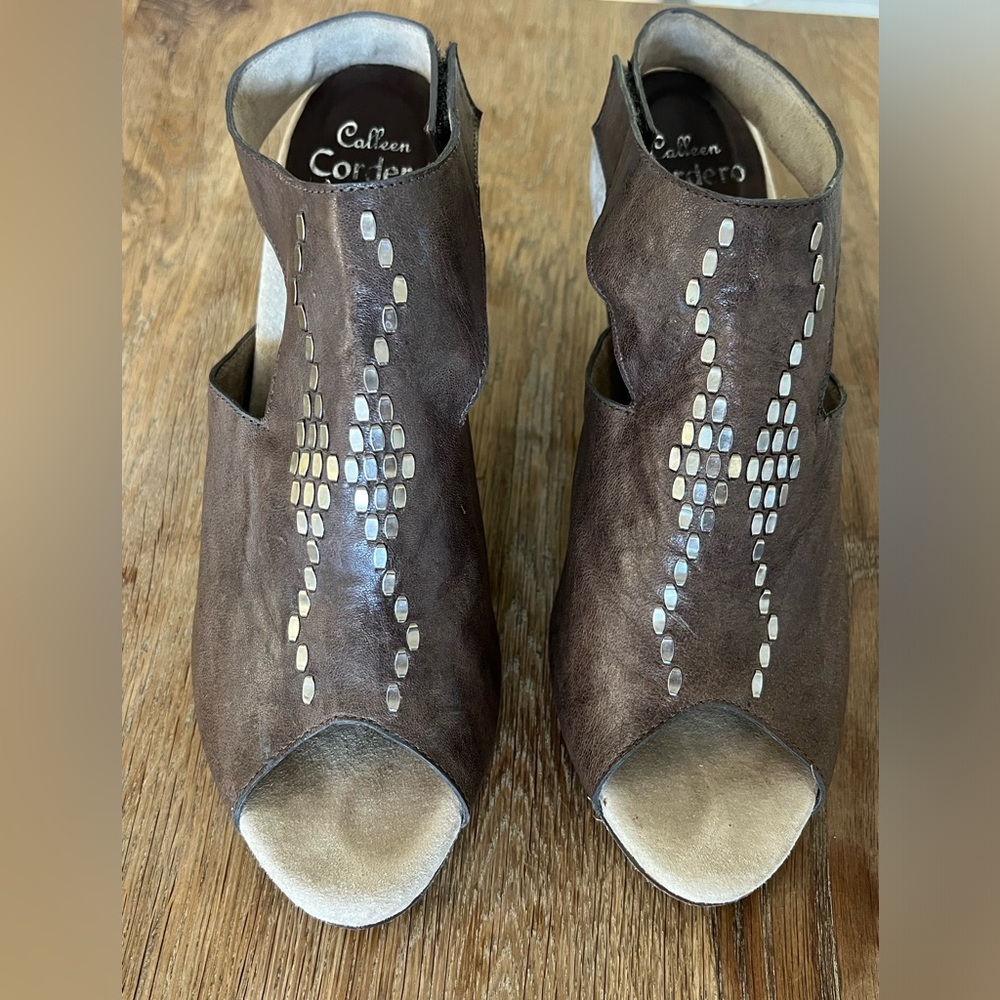 Colleen Cordero brown leather heels with nickel accents